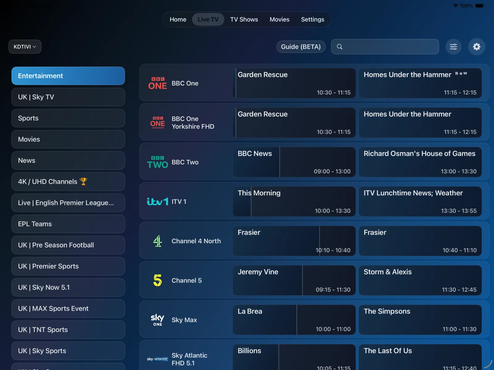 The same live TV guide on iPad, with channel categories down the side